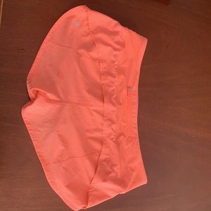 Size 8 Speed up 2.5 lululemon shorts in the color sunset pink